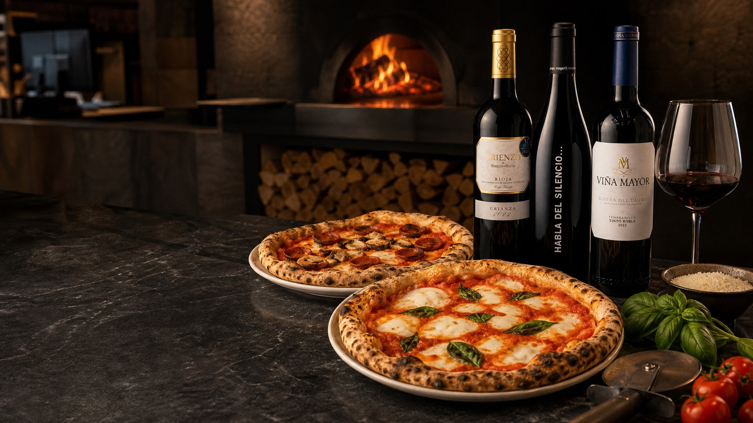 Pizza fra stenovn med spanske rødvine fra DeVinos